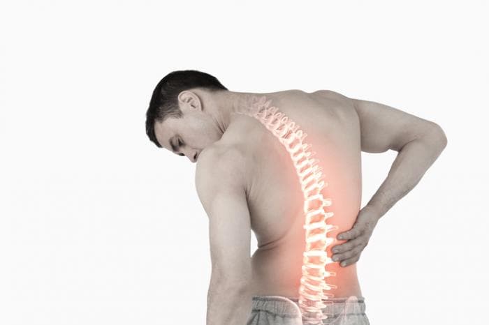 What is the definition of spinal surgery?